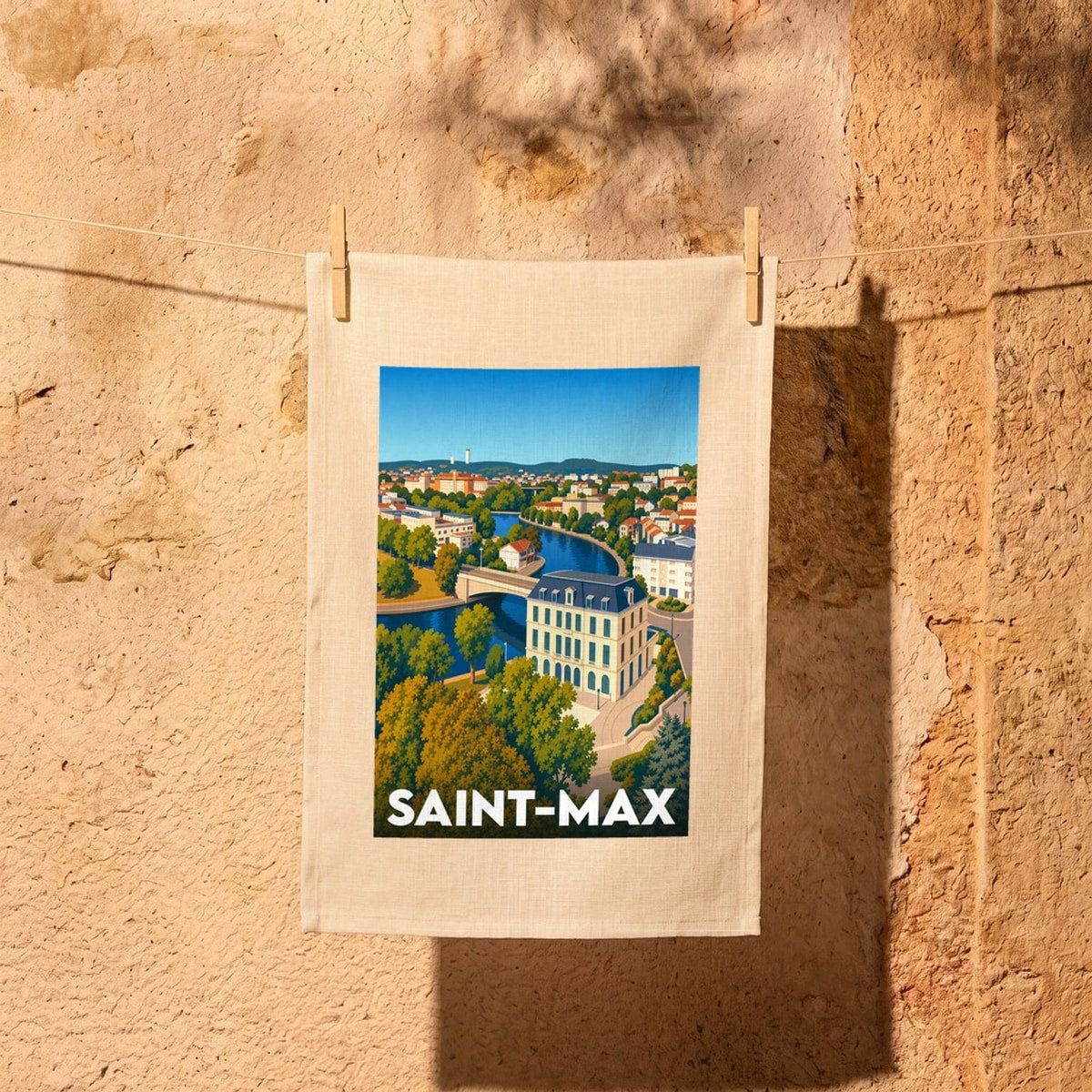 Torchon souvenir de la ville de Saint-Max avec une illustration stylisée.