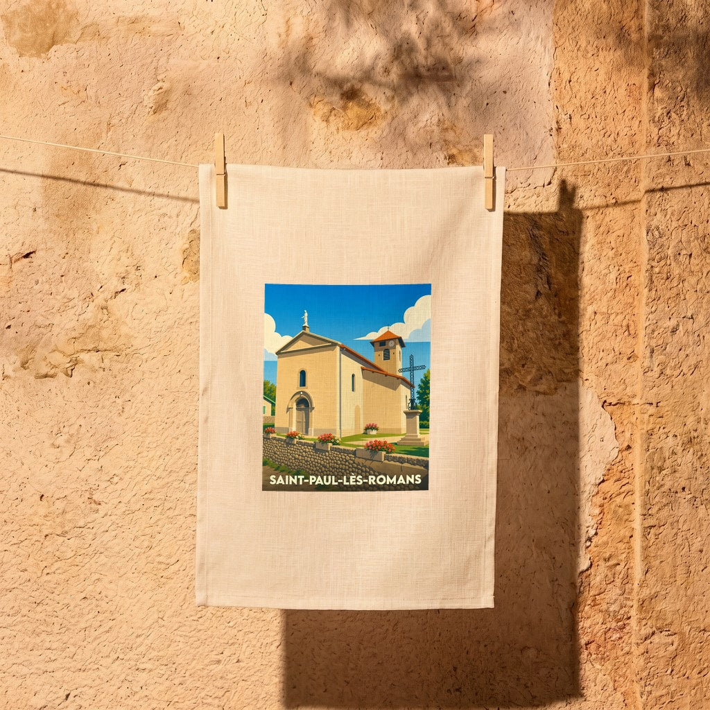 Torchon souvenir de la ville de Saint-Paul-lès-Romans avec une illustration stylisée d'une église provençale.