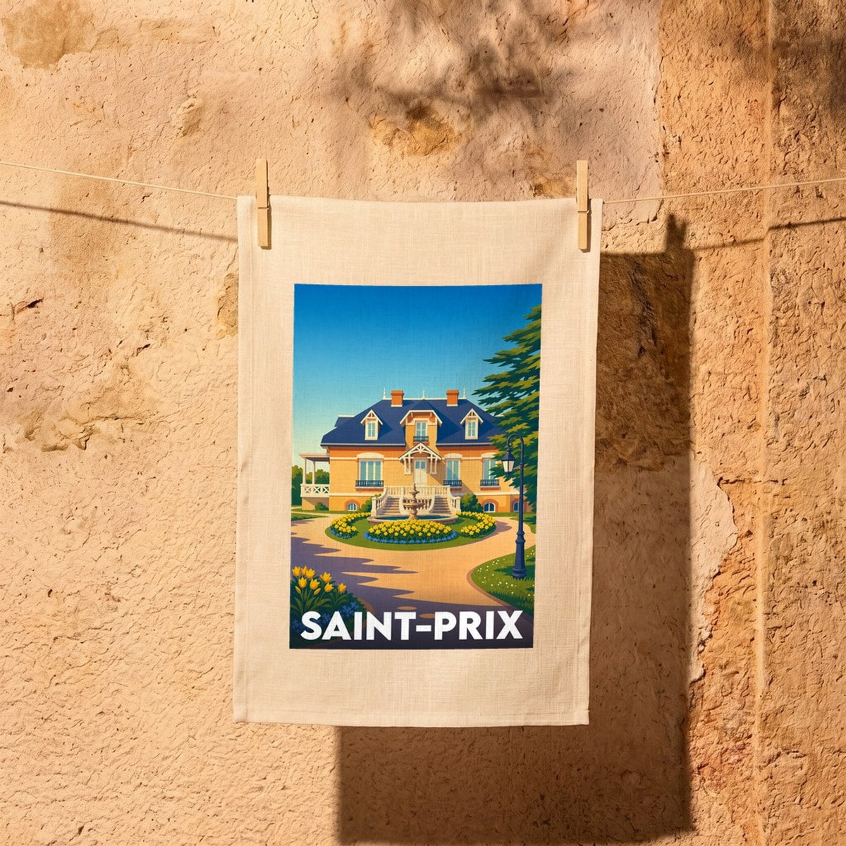 Torchon souvenir de la ville de Saint-Prix illustré par une élégante demeure bourgeoise de style vintage.