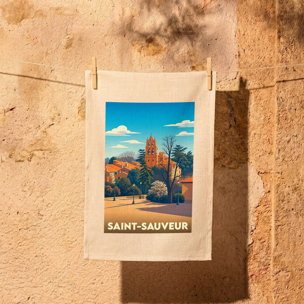 Torchon souvenir de la ville de Saint-Sauveur illustré d'un paysage urbain stylisé.