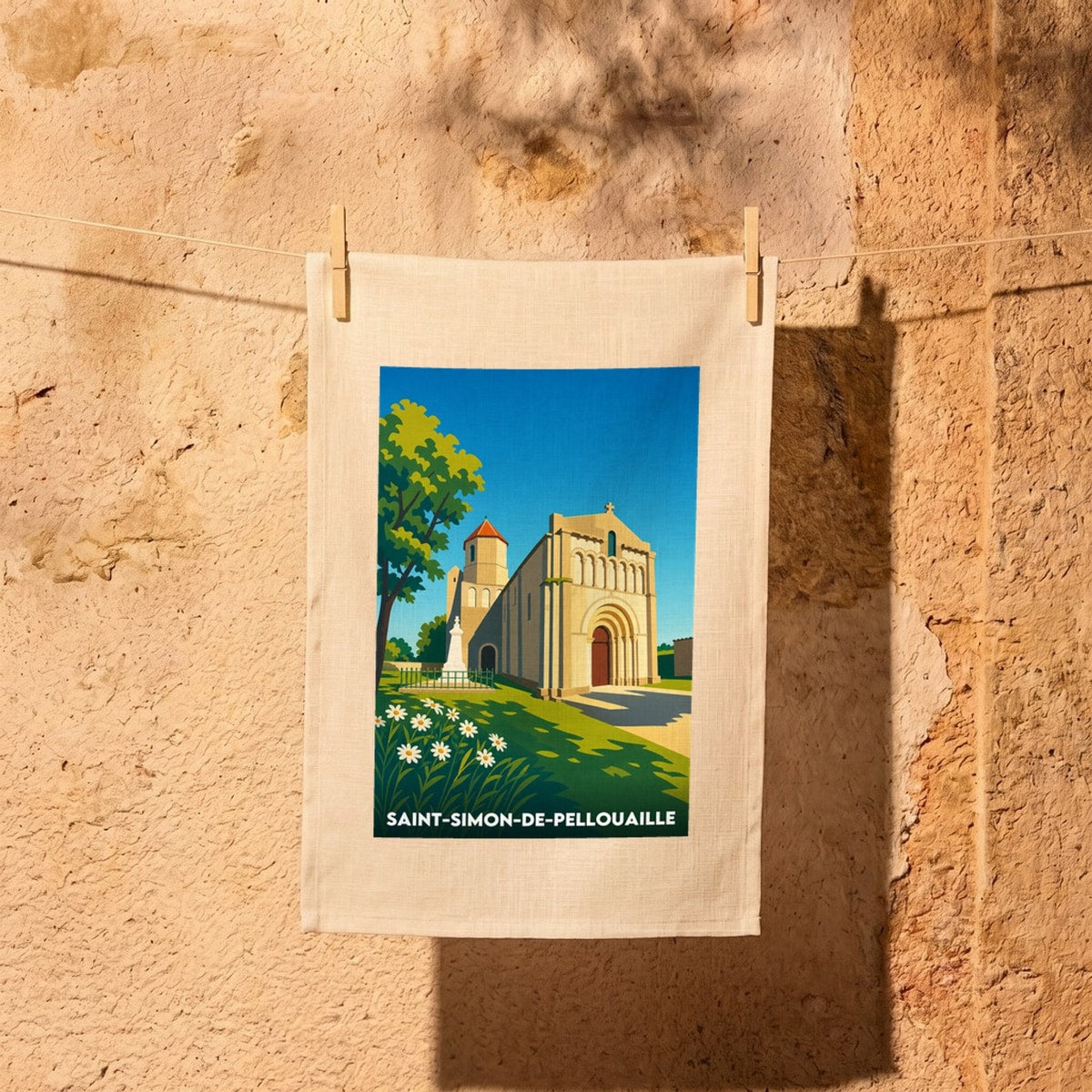 Torchon souvenir de Saint-Simon-de-Pellouaille avec une illustration stylisée de son église romane.