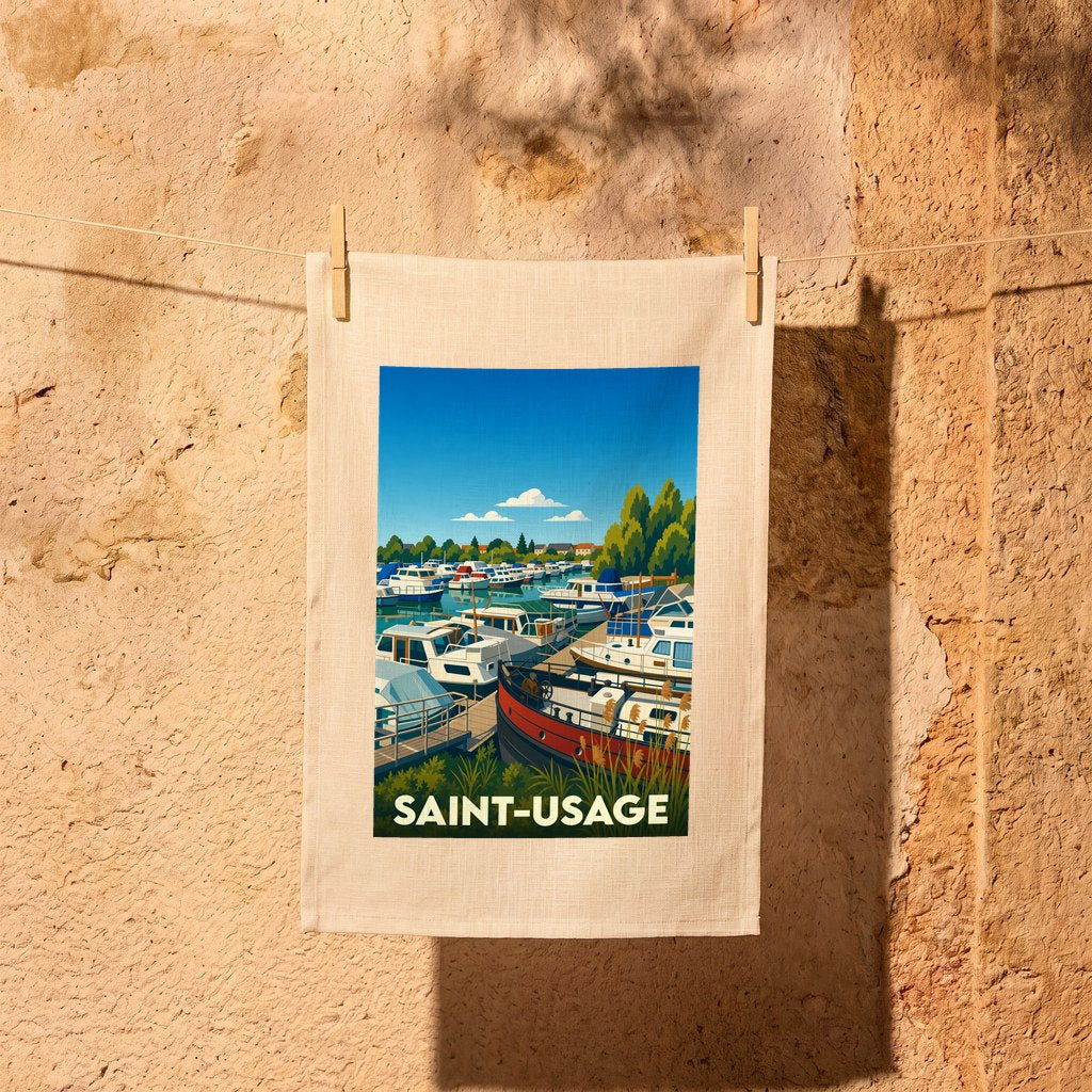 Torchon souvenir de la ville de Saint-Usage avec une illustration stylisée de son port de plaisance.