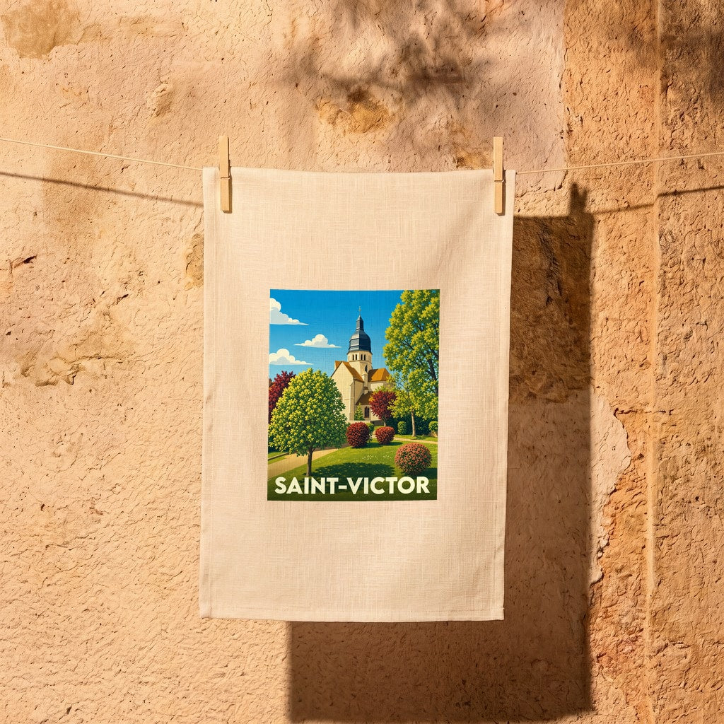 Torchon souvenir de la ville de Saint-Victor avec une illustration stylisée.