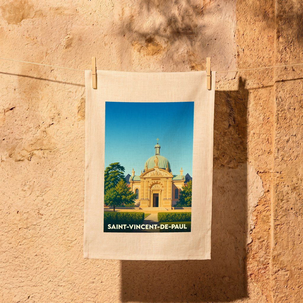 Torchon souvenir de la ville de Saint-Vincent-de-Paul avec une illustration stylisée de son église.