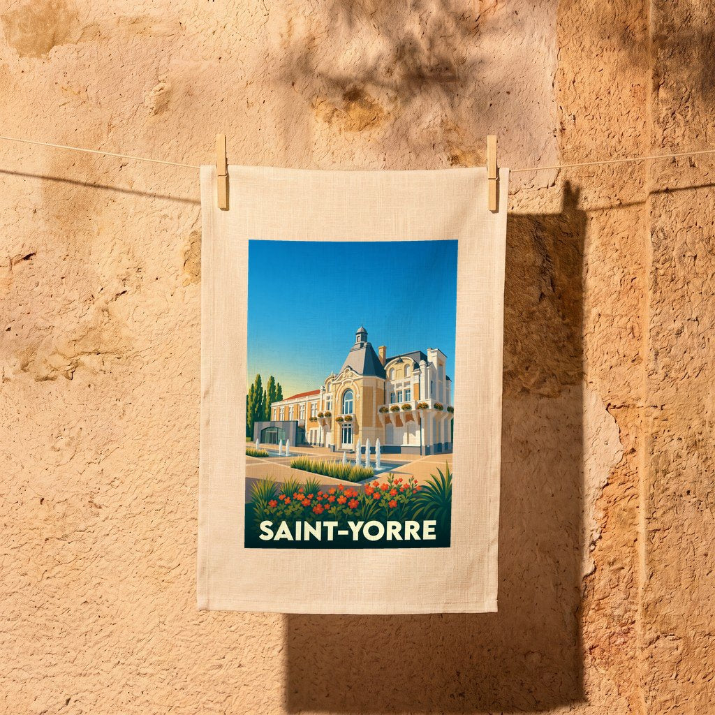 Torchon souvenir de la ville de Saint-Yorre avec une illustration stylisée d'un bâtiment thermal.