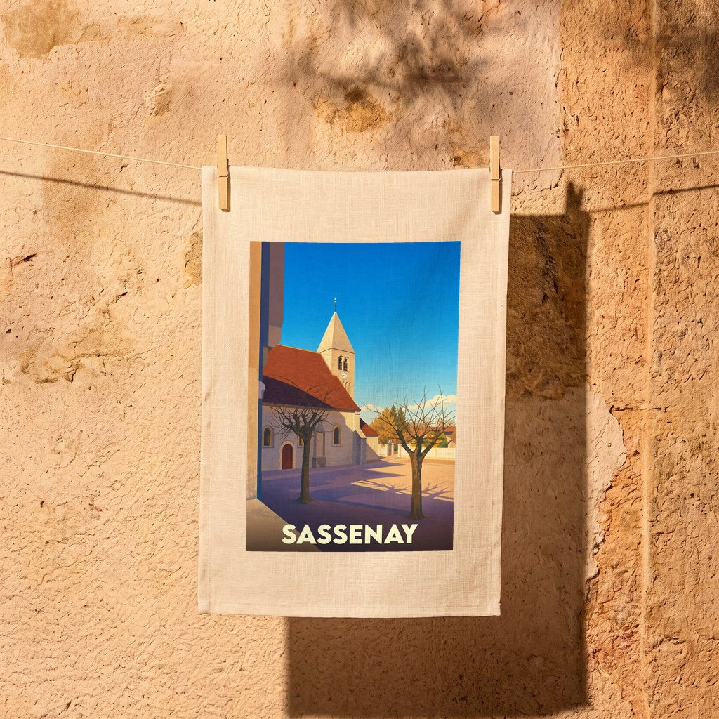 Torchon souvenir de la ville de Sassenay avec une illustration stylisée.