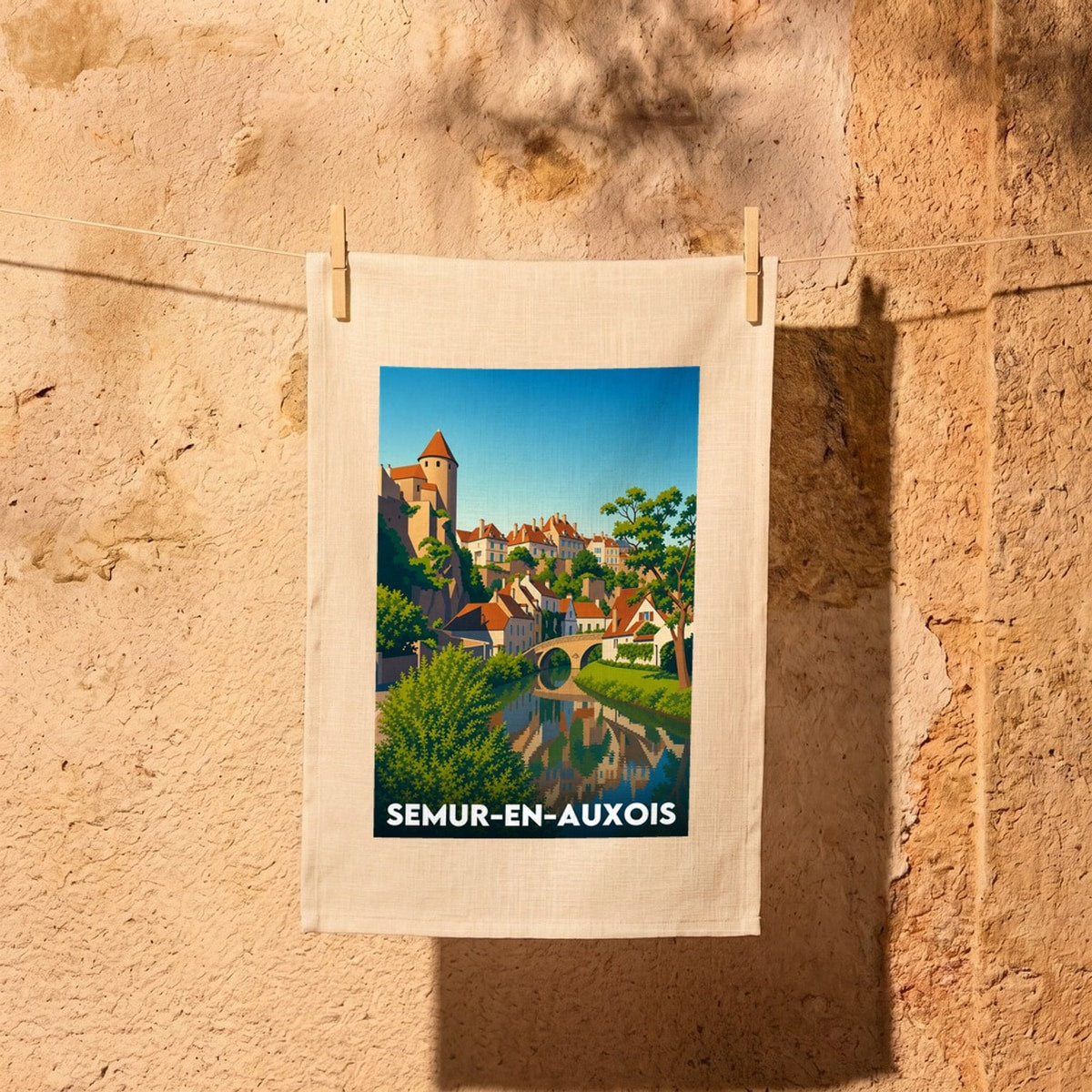 Torchon souvenir de la ville de Semur-en-Auxois avec une illustration stylisée.