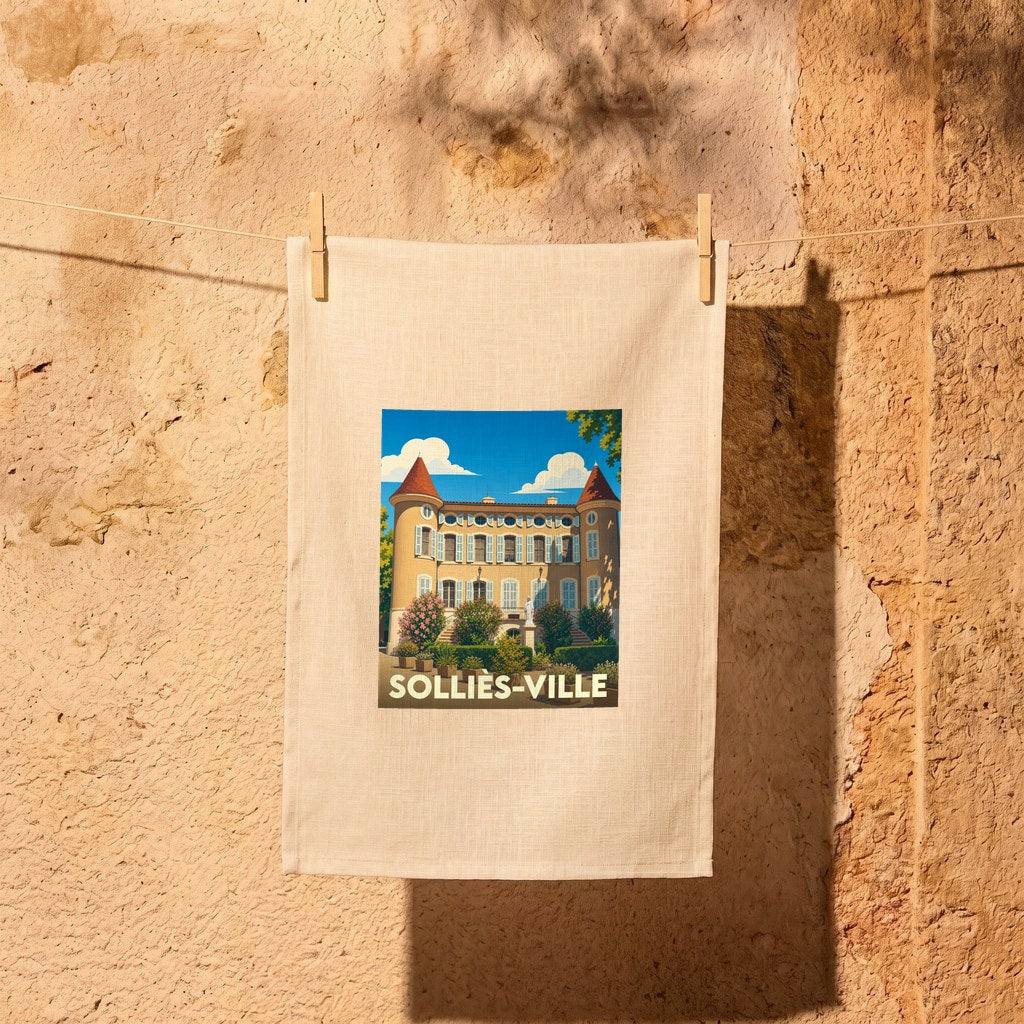 Torchon souvenir de Solliès-Ville orné d'une illustration stylisée de son château provençal sous un ciel bleu.