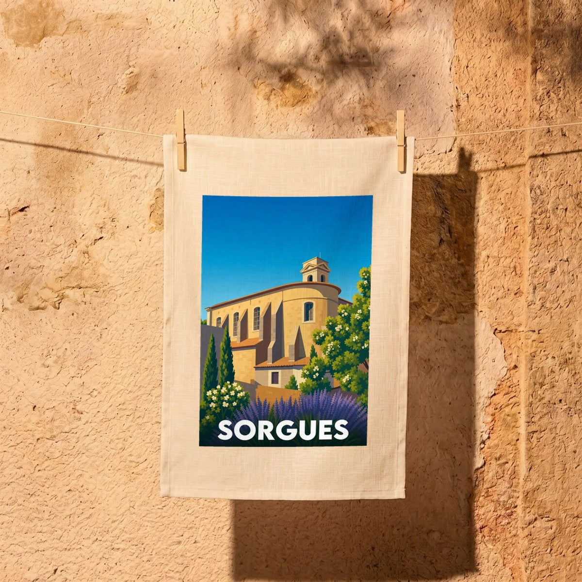 Torchon souvenir de la ville de Sorgues avec une illustration stylisée.