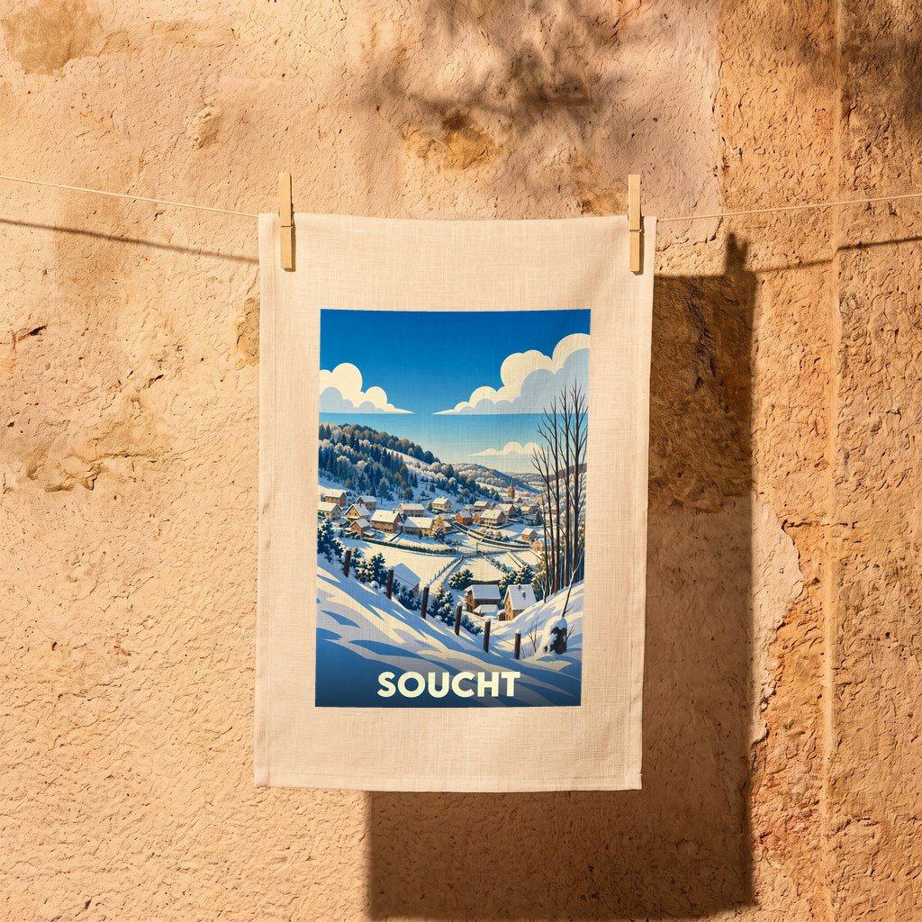 Torchon souvenir de la ville de Soucht orné d'une illustration hivernale stylisée.