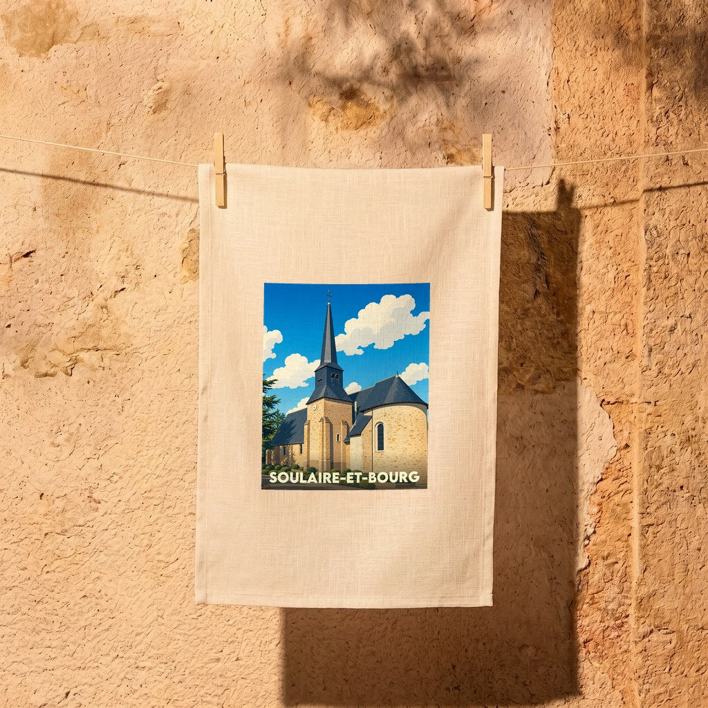 Torchon souvenir de la ville de Soulaire-et-Bourg avec une illustration stylisée de son église.