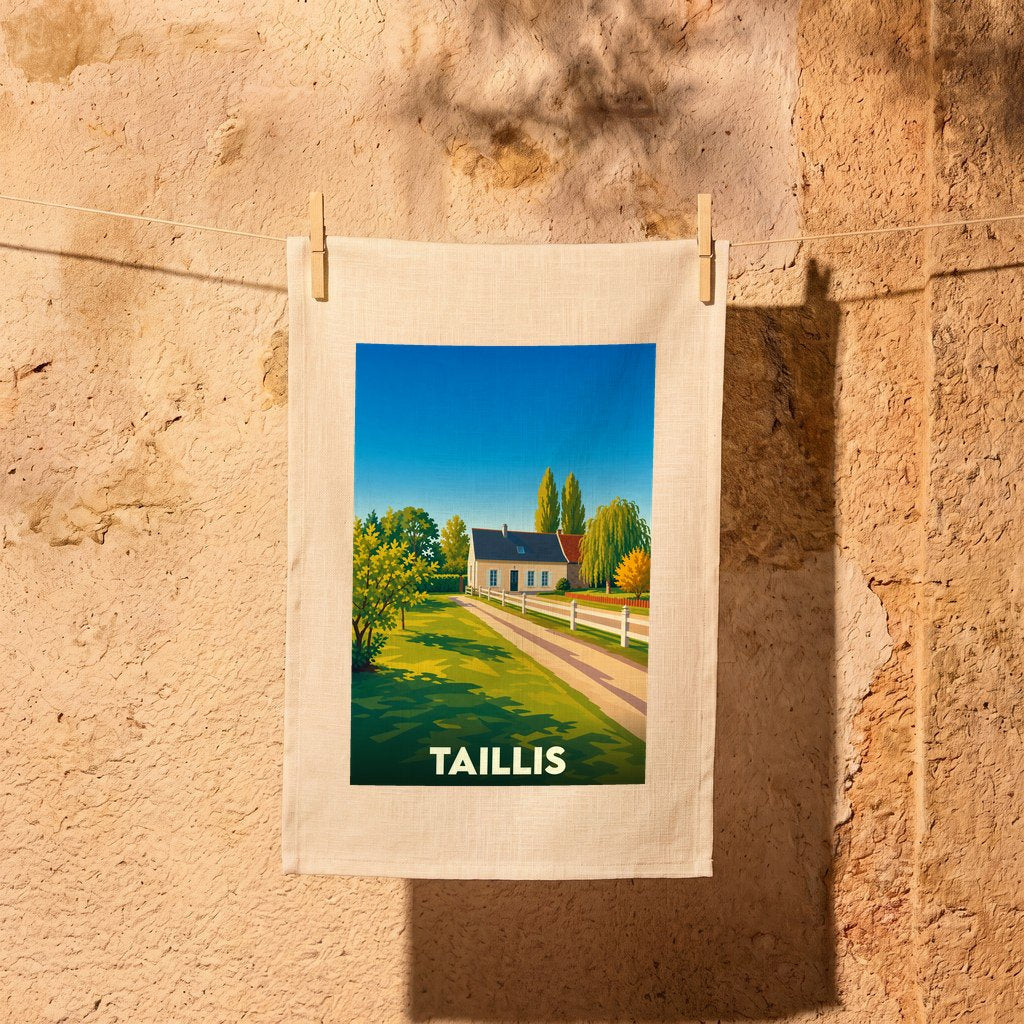 Torchon souvenir de la ville de Taillis avec une illustration stylisée d'une maison de campagne.