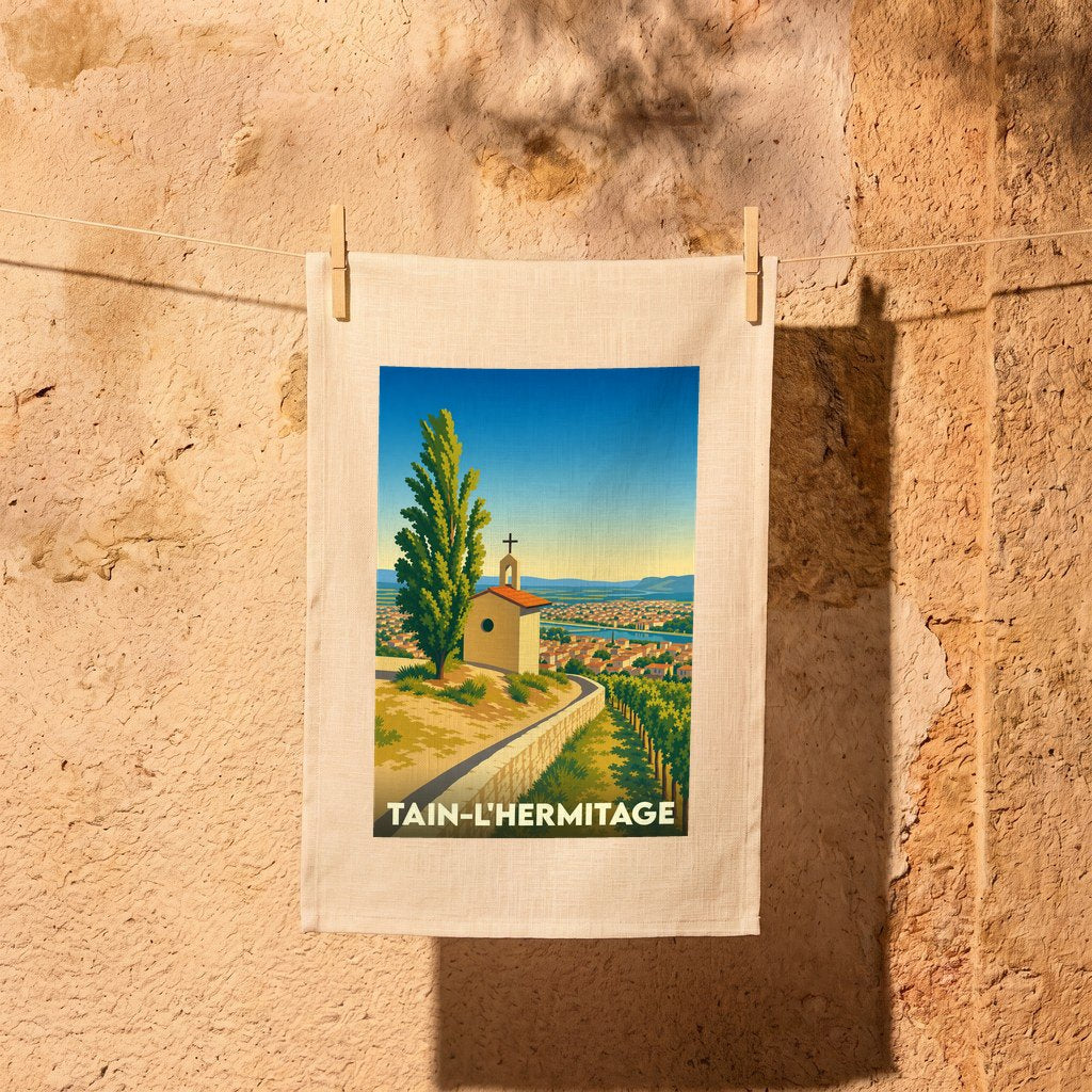 Torchon souvenir de la ville de Tain-l'Hermitage avec une illustration stylisée.