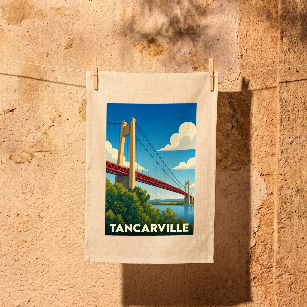 Torchon souvenir de la ville de Tancarville illustré d'un pont suspendu dans un style vintage.