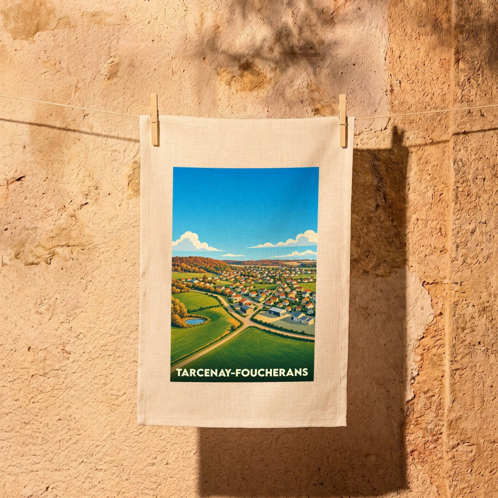 Torchon souvenir de la commune de Tarcenay-Foucherans avec une illustration stylisée du village et de ses paysages.