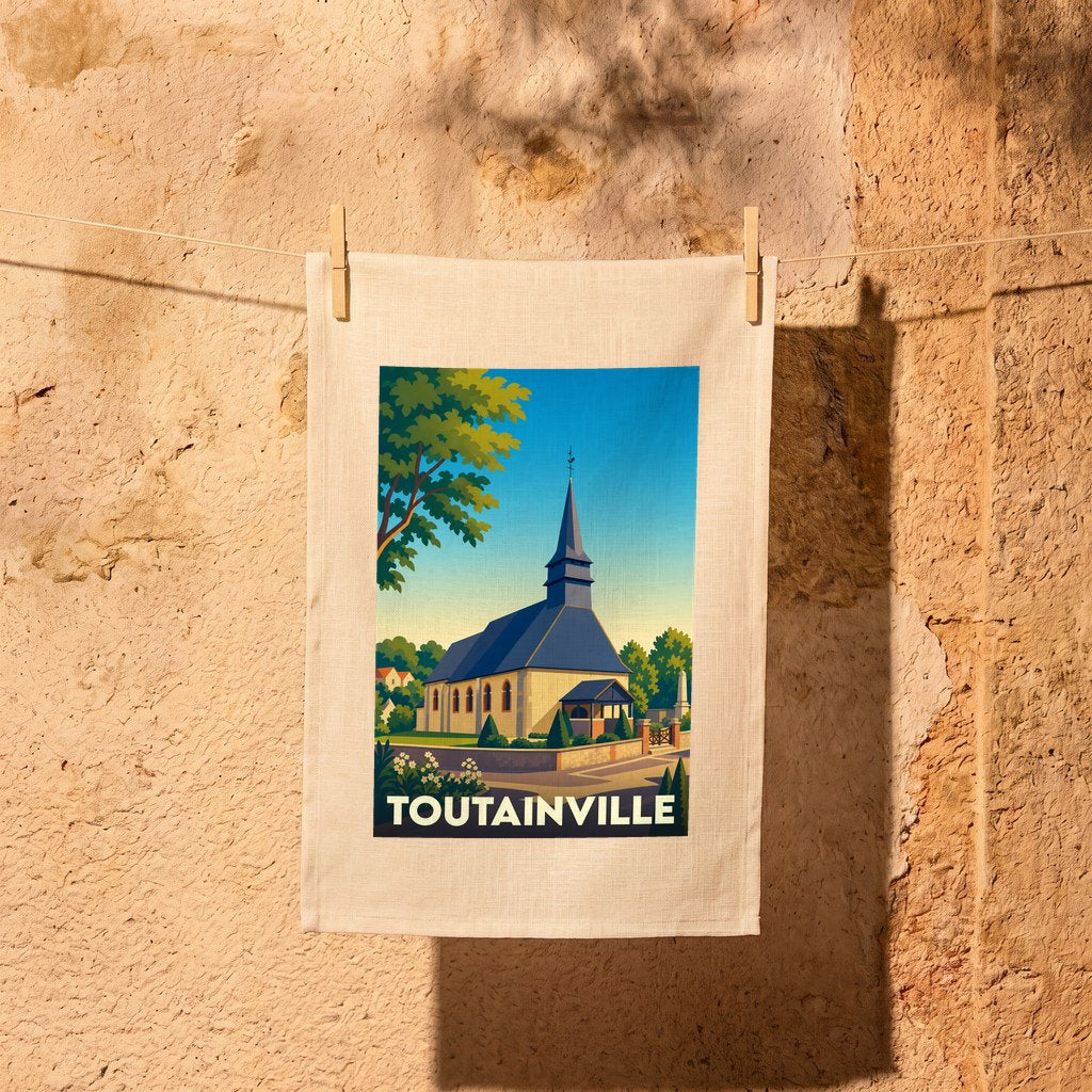 Torchon souvenir de la ville de Toutainville illustré d'une église de style normand.