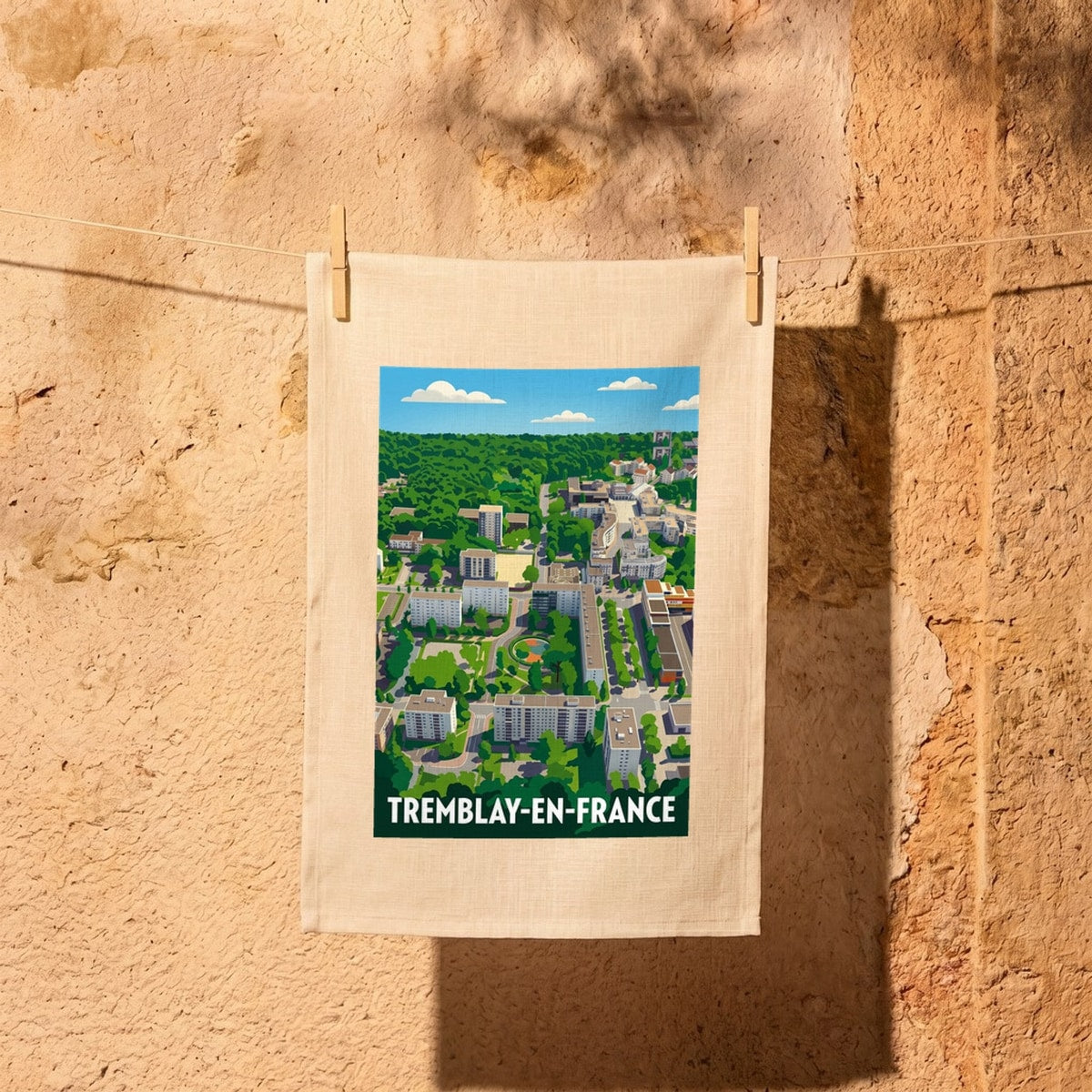 Torchon souvenir de la ville de Tremblay-en-France avec une illustration stylisée.