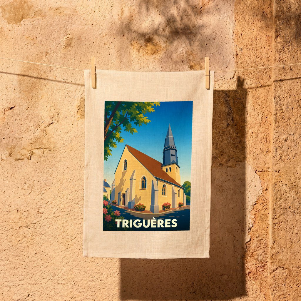Torchon souvenir de la ville de Triguères avec une illustration stylisée de son église.