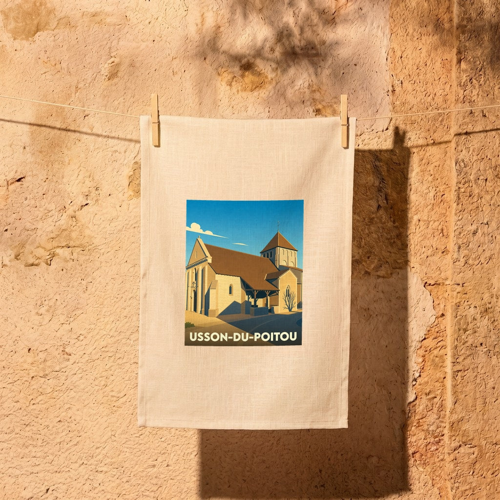 Torchon souvenir de la ville d'Usson-du-Poitou avec une illustration stylisée de son église.