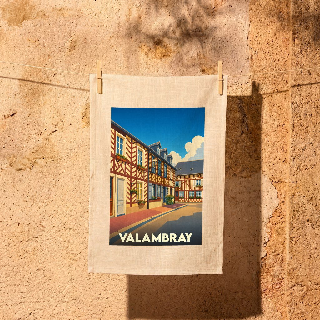 Torchon souvenir de la ville de Valambray avec une illustration stylisée de maisons à colombages.