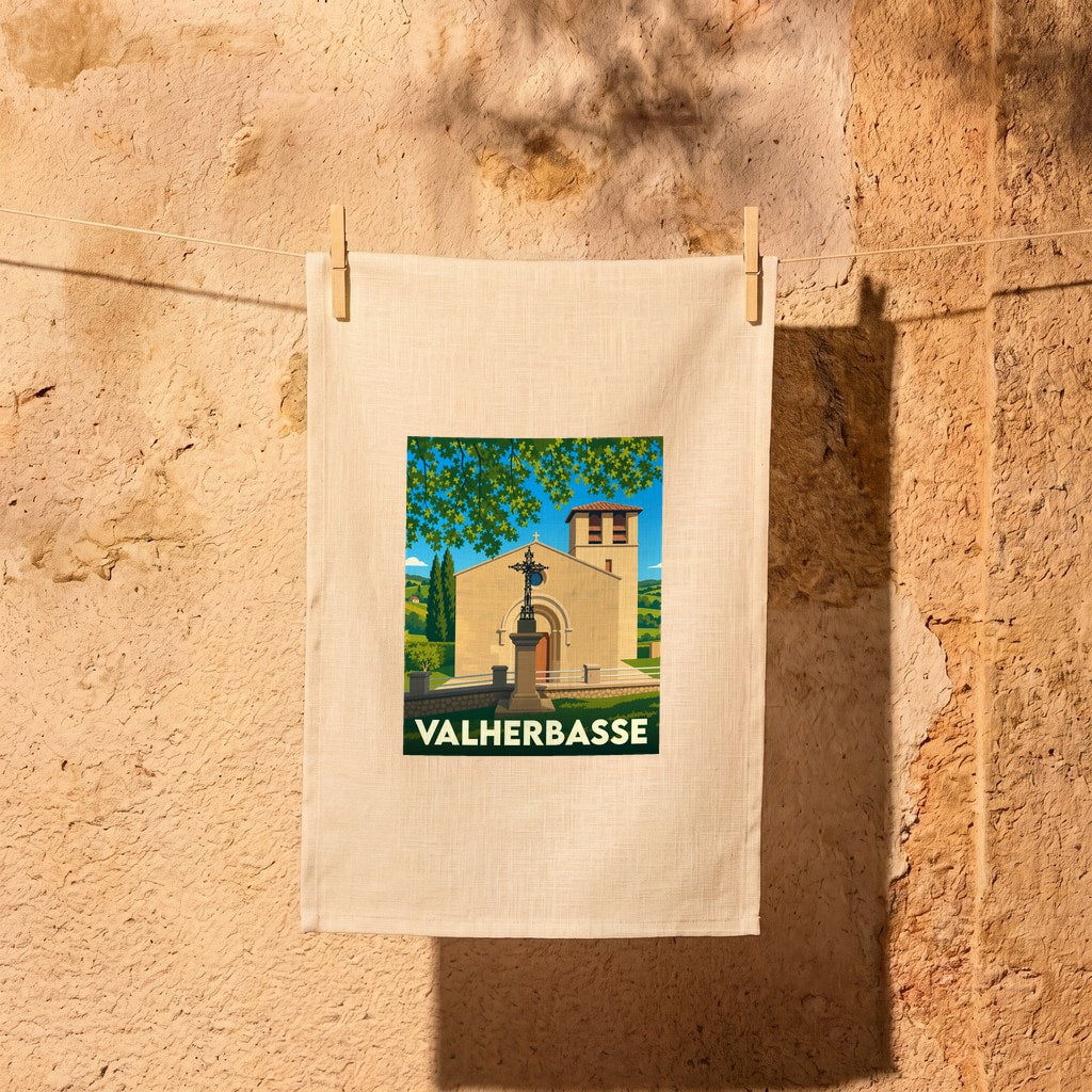 Torchon souvenir de la commune de Valherbasse avec une illustration stylisée de son patrimoine.
