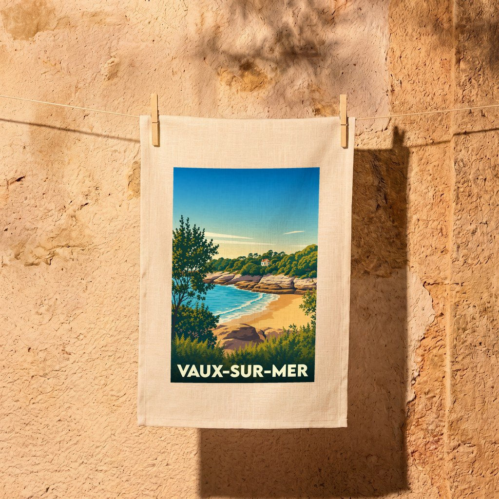 Torchon souvenir de la ville de Vaux-sur-Mer illustré d'une vue stylisée sur une plage et la mer.