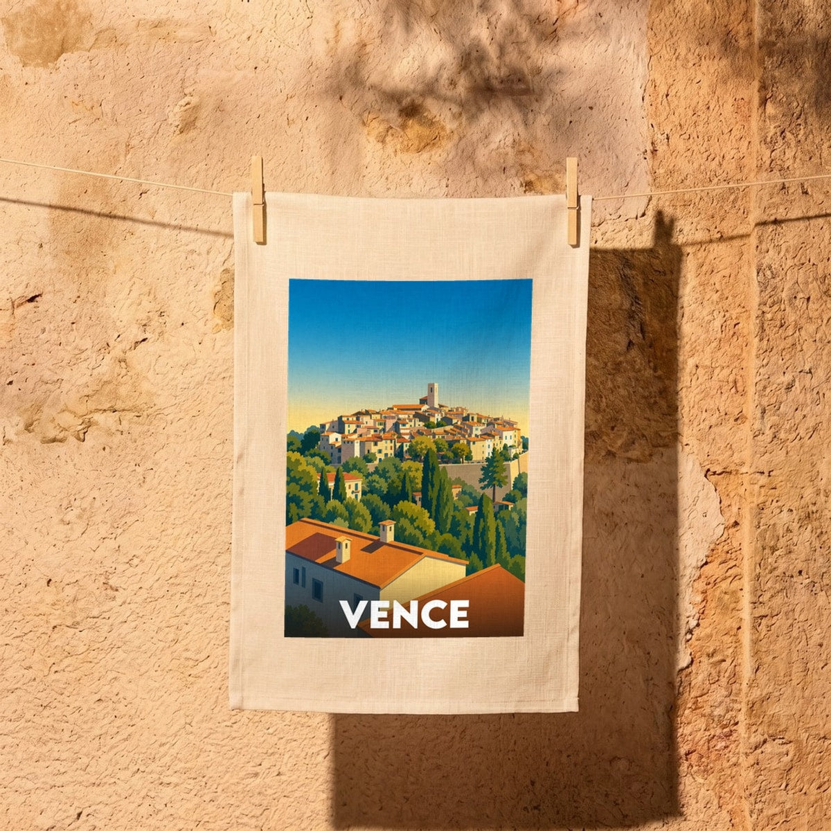 Torchon souvenir de la ville de Vence avec une illustration stylisée.