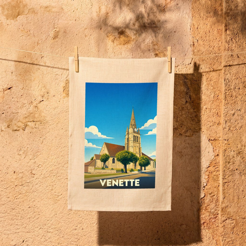 Torchon souvenir de la ville de Venette avec une illustration stylisée de son église.