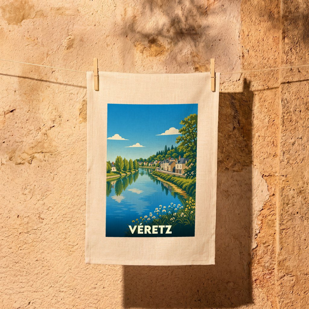 Torchon souvenir de la ville de Véretz avec une illustration stylisée d'un paysage fluvial.