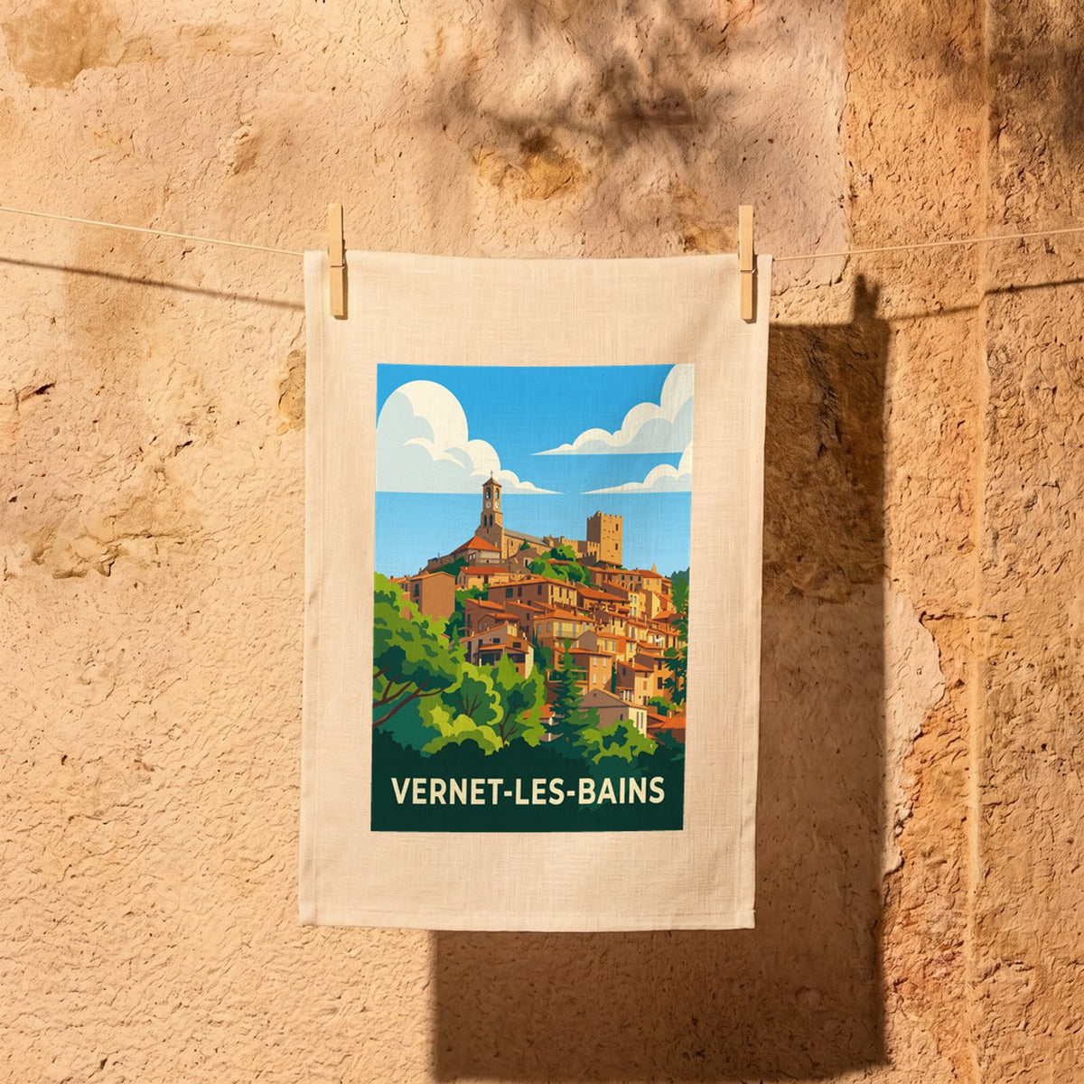 Torchon souvenir de la ville de Vernet-les-Bains avec une illustration stylisée.