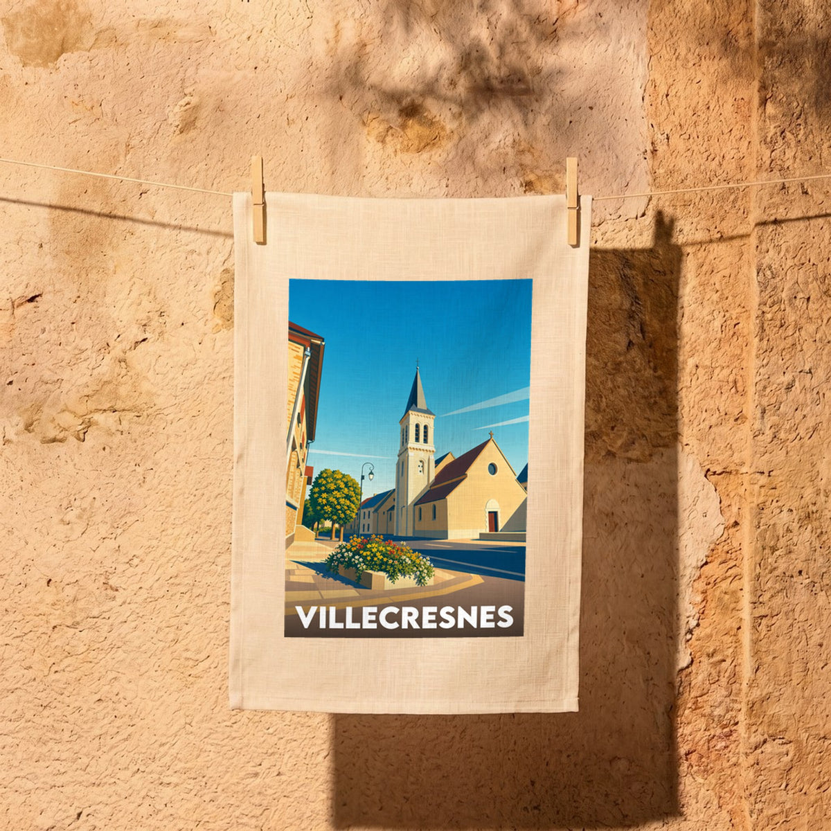 Torchon souvenir de la ville de Villecresnes avec une illustration stylisée.