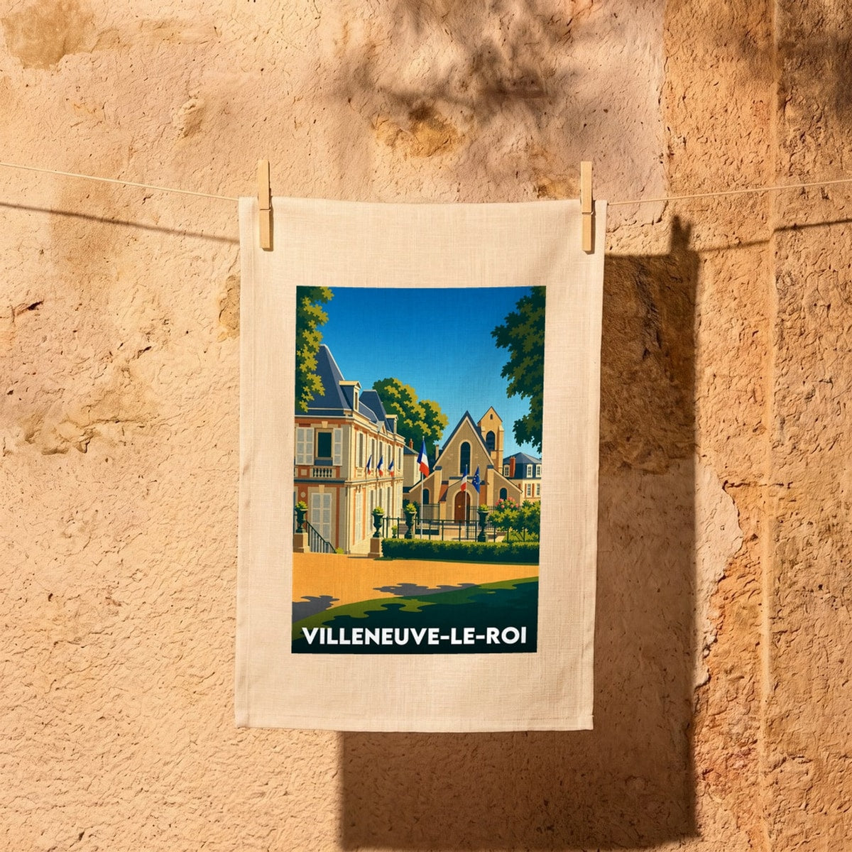 Torchon souvenir de la ville de Villeneuve-le-Roi avec une illustration stylisée.