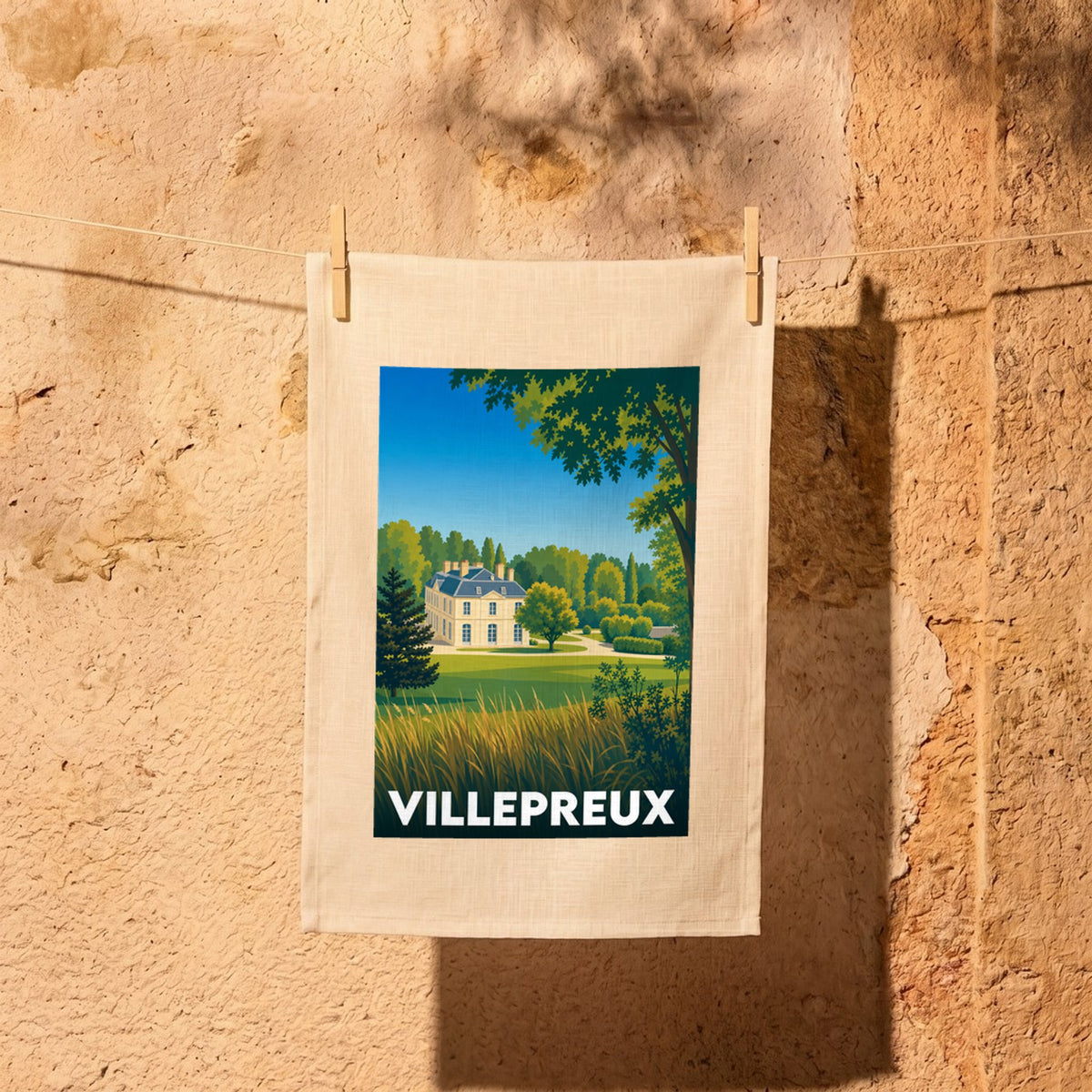 Torchon souvenir de la ville de Villepreux avec une illustration stylisée.