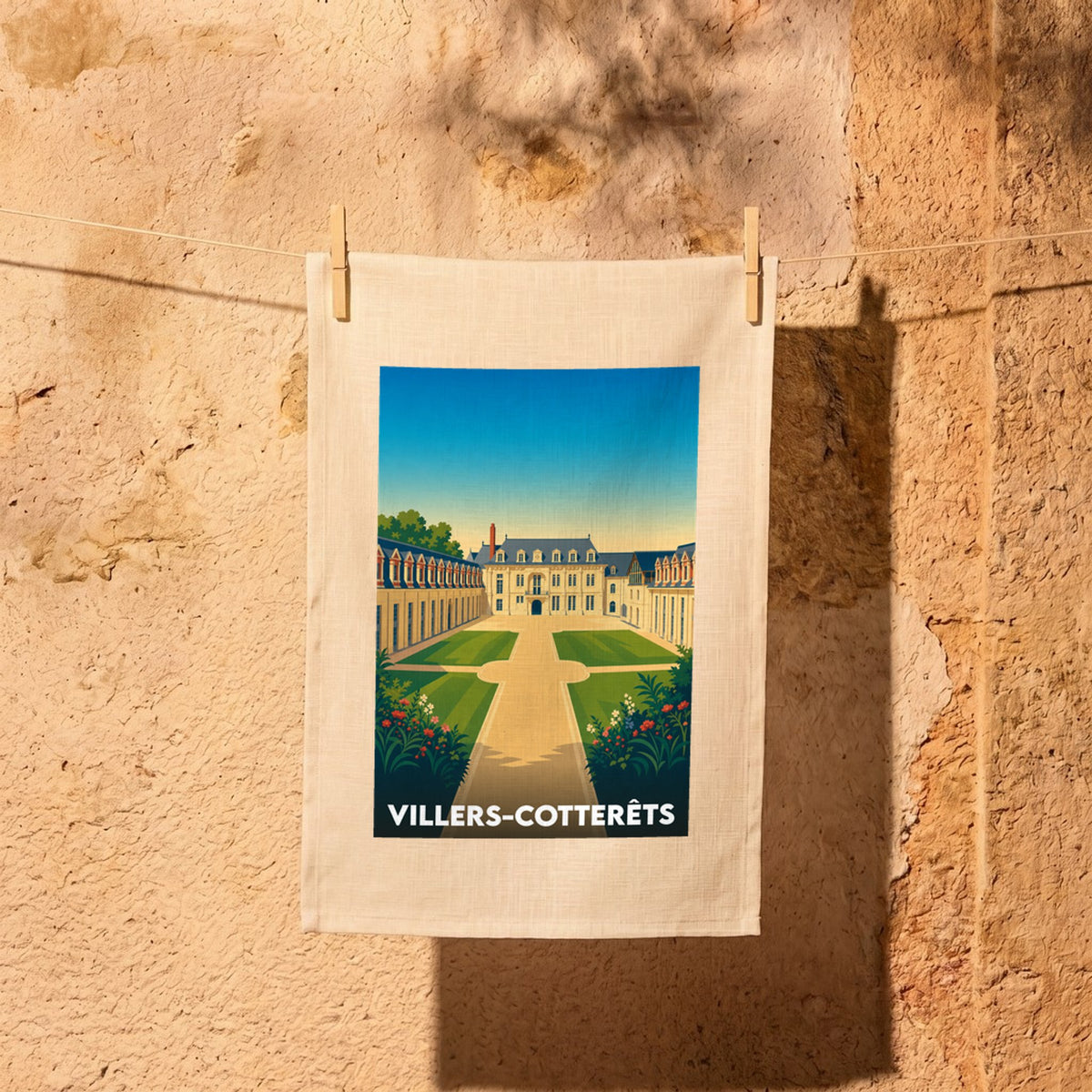 Torchon souvenir de la ville de Villers-Cotterêts avec une illustration stylisée de son château.