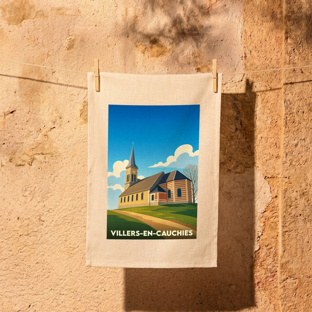 Torchon souvenir de la ville de Villers-en-Cauchies avec une illustration stylisée de son église.