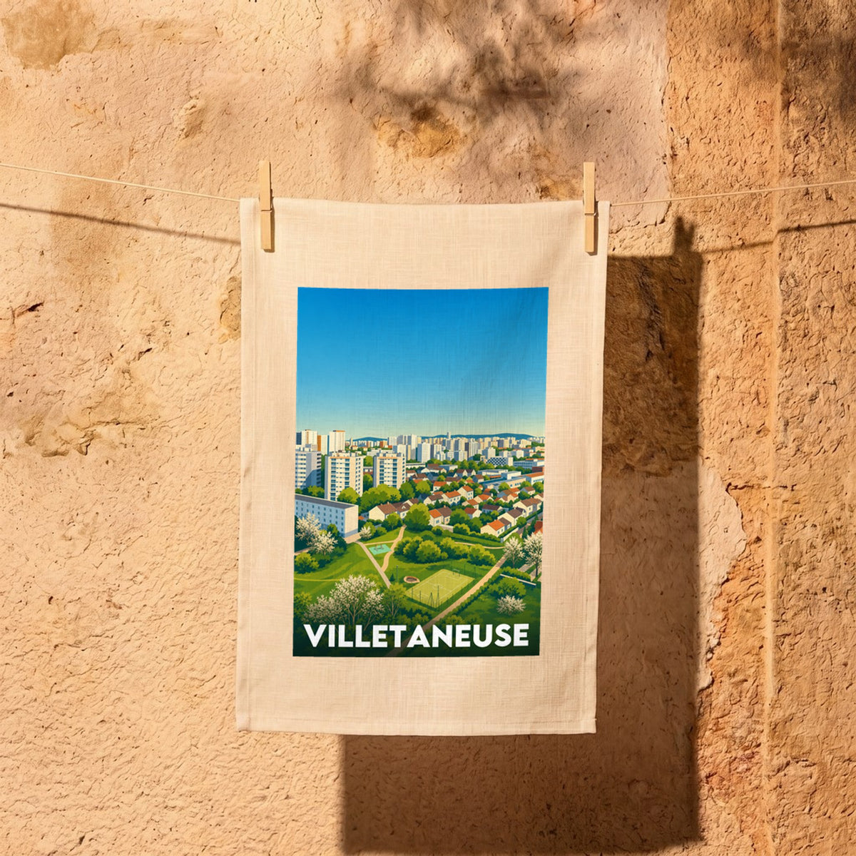 Torchon souvenir de la ville de Villetaneuse avec une illustration urbaine colorée et stylisée.