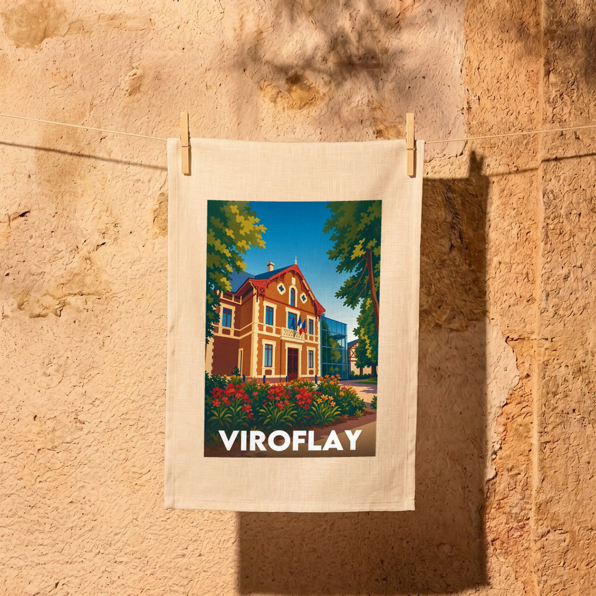 Torchon souvenir de la ville de Viroflay avec une illustration stylisée d'un bâtiment historique et de la végétation.