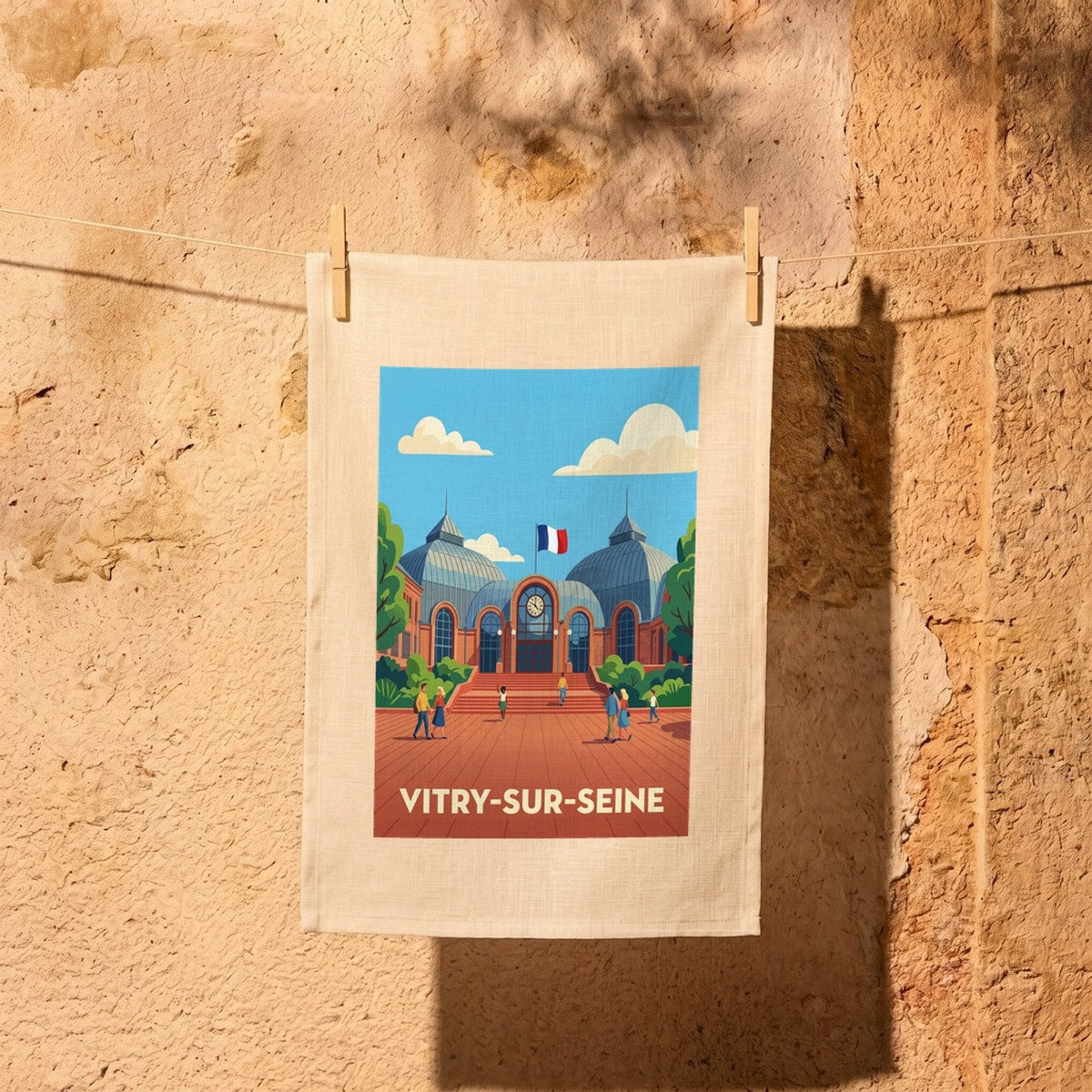Torchon souvenir de la ville de Vitry-sur-Seine avec une illustration colorée et stylisée.