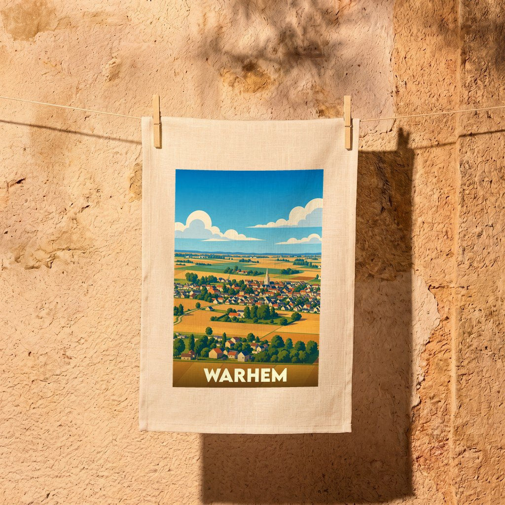 Torchon souvenir de la ville de Warhem illustré d'un paysage de campagne stylisé.