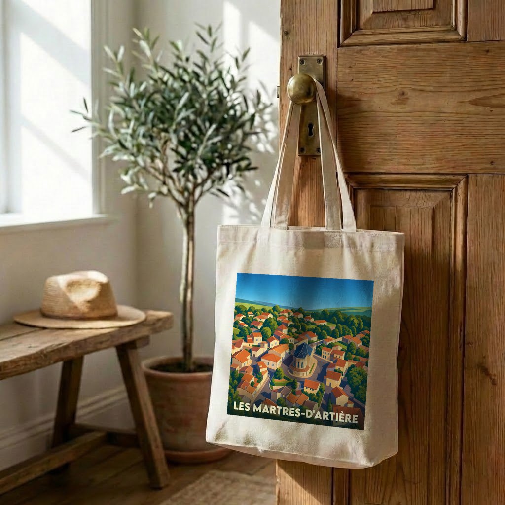 Tote bag souvenir de la ville de Les Martres-d'Artière avec une illustration stylisée.