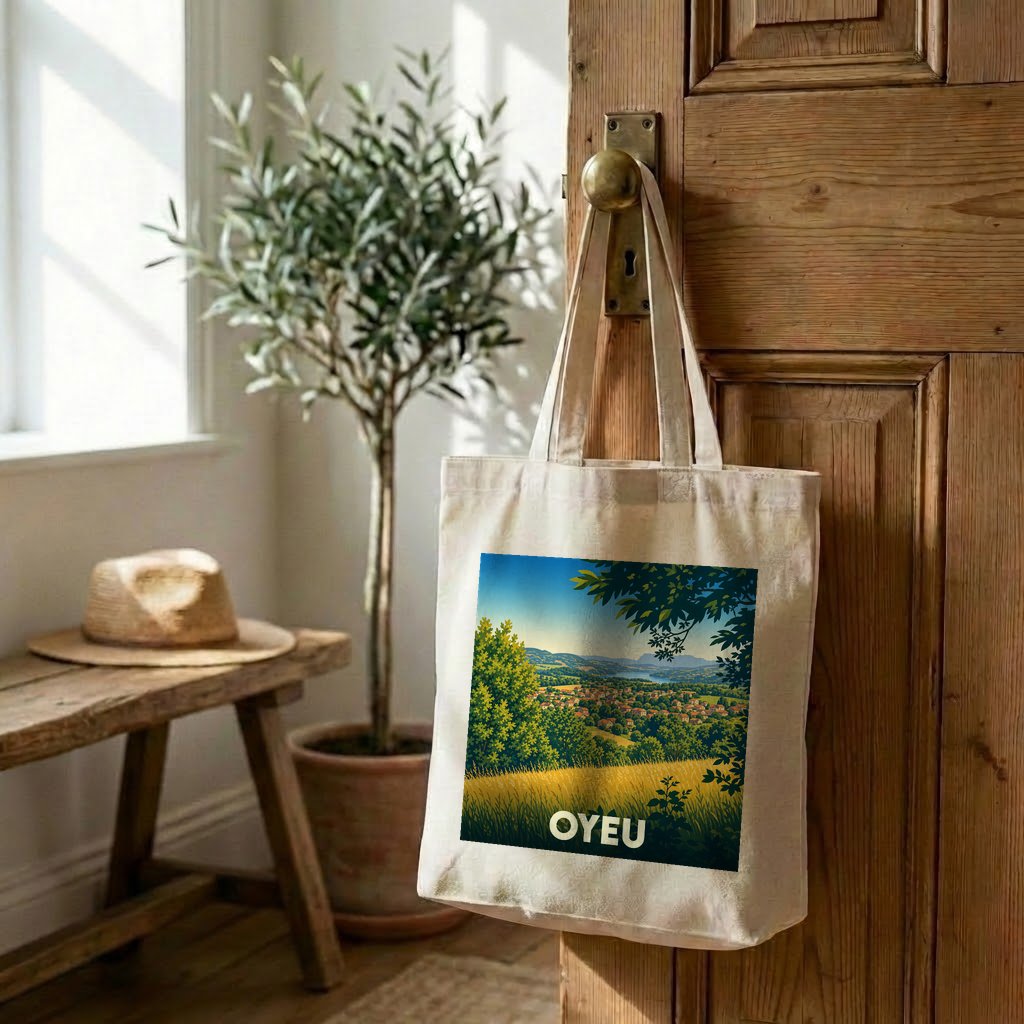 Tote bag souvenir de la ville d'Oyeu avec une illustration de paysage vallonné.