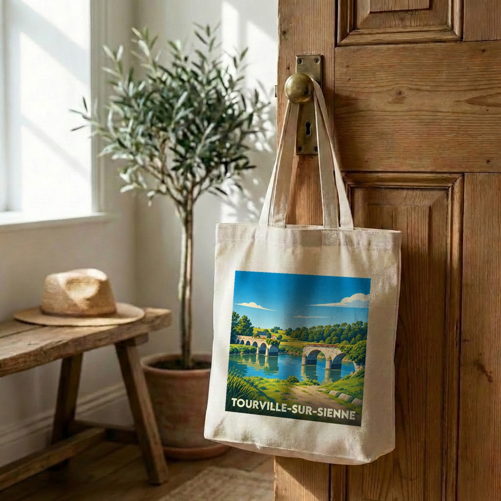Tote bag souvenir de la ville de Tourville-sur-Sienne avec une illustration stylisée d'un pont de pierre.