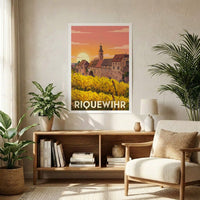 Affiche souvenir de la ville de Riquewihr avec une illustration stylisée d'un paysage de vignobles au soleil couchant.