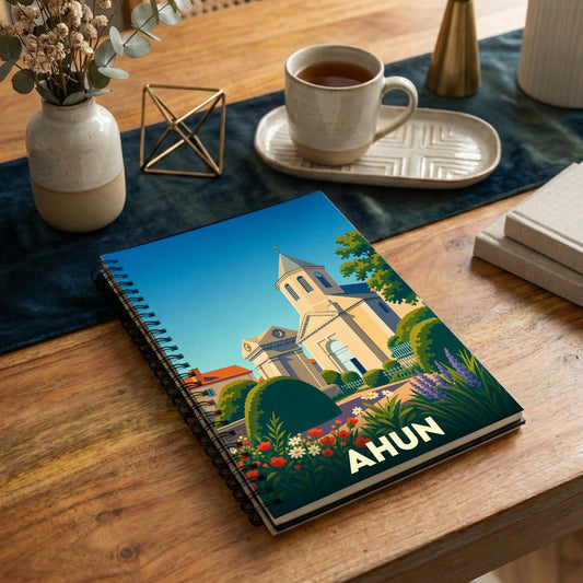 Carnet à spirales souvenir de la ville d'Ahun avec une illustration stylisée de son église.