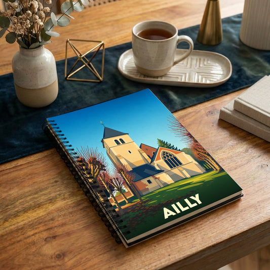 Carnet souvenir de la ville d'Ailly illustré d'un dessin stylisé de son église.
