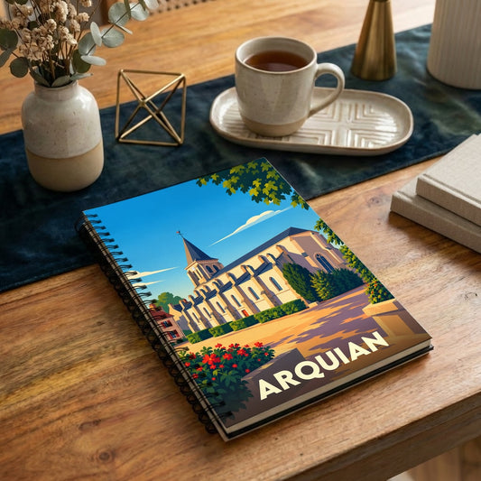 Carnet à spirales souvenir de la ville d'Arquian avec une illustration stylisée de son église.