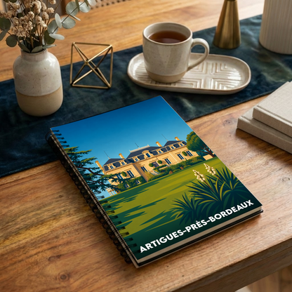 Carnet à spirales souvenir de la ville de Artigues-près-Bordeaux avec une illustration stylisée de son patrimoine.