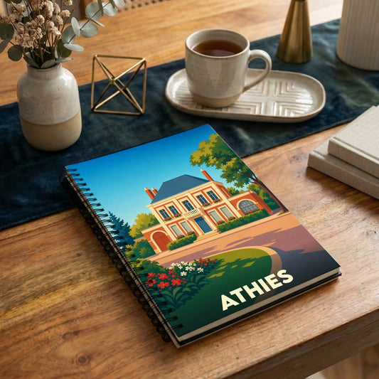 Carnet à spirales souvenir de la ville de Athies avec une illustration colorée et stylisée d'une demeure bourgeoise.