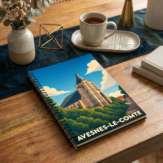 Carnet souvenir de la ville d'Avesnes-le-Comte avec une illustration stylisée de son église.