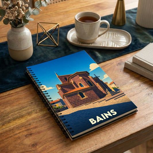 Carnet souvenir de la ville de Bains avec une illustration stylisée de son église.